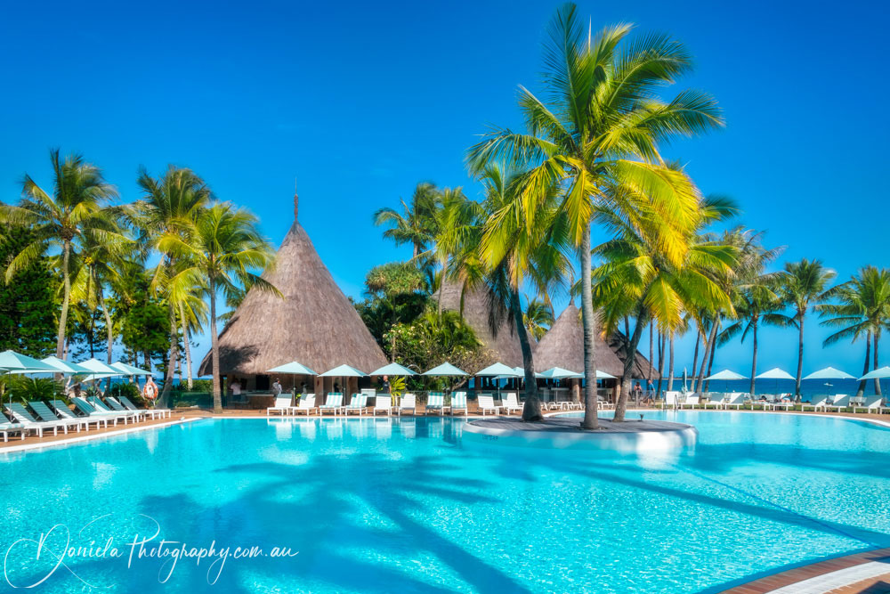 New Caledonia Internal courtyard with the blue water pool open directly towards Anse Vata beach